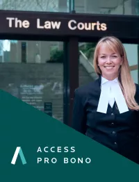 women lawyer standing in front of the law court with the pro bono logo