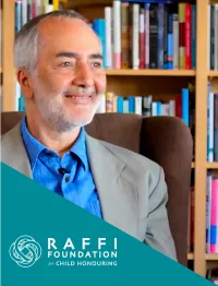 Raffi with a woman with the Raffi Foundation logo